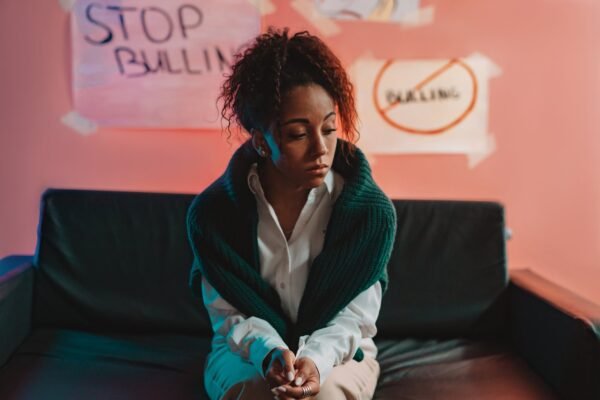 a woman sitting on the couch