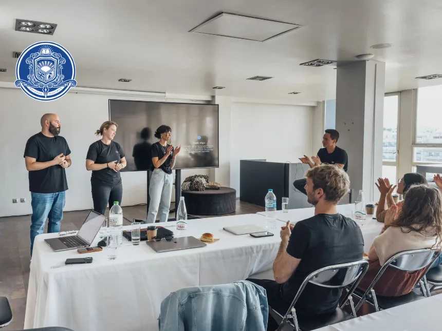 Team presentation with audience applauding in office