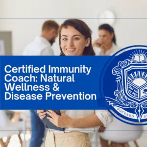 A smiling woman holding a tablet during a certification event for immunity coaching.