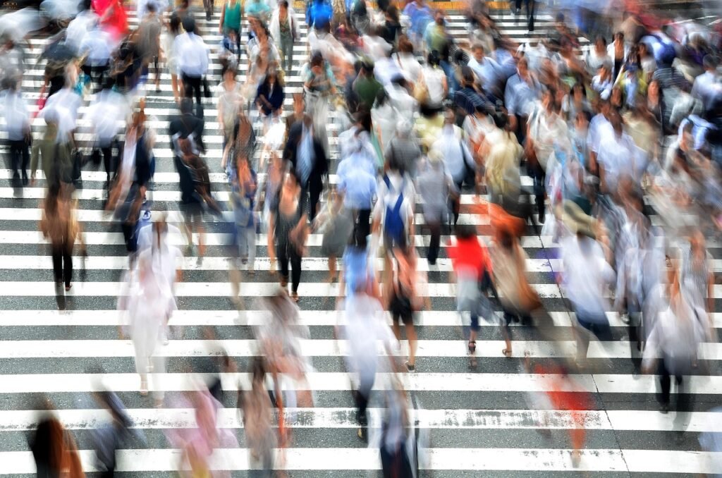 Pedestrians, people, busy, movement, hectic, representing quick, snappy, fast judgment, implicit bias